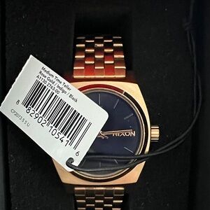 Nixon Gold and Black Smartwatch